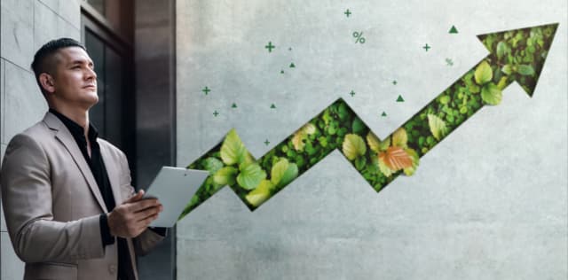 Grafico verde con flecha hacia arriba simbolizando el crecimiento de la empresa